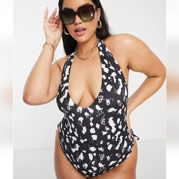 ASOS DESIGN Curve adjustable leg halter swimsuit - Picture 1 of 3